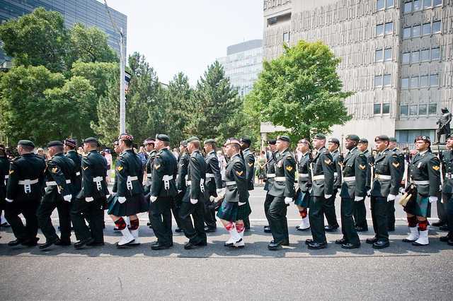 The Queen inspected troops, did a "walkabout" and listened to some marching music at Queen's Park today.