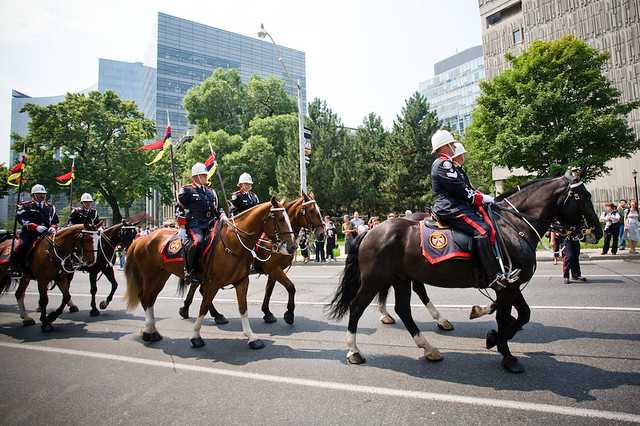 The Queen inspected troops, did a "walkabout" and listened to some marching music at Queen's Park today.